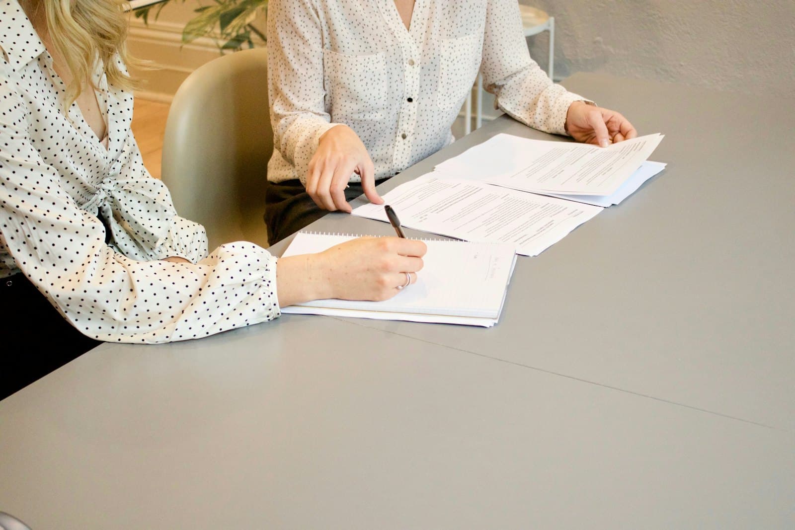 Reviewing documents together at a desk