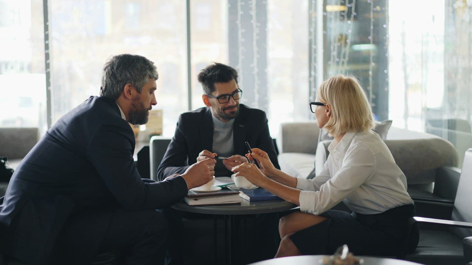 Partners meeting with a client